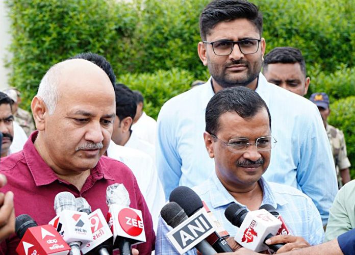 Arvind Kejriwal with Manish Sisodia