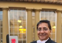 The Indian-origin charity worker was honored at Buckingham Palace