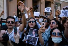 Iran disbands controversial morality police, signs change in hijab law