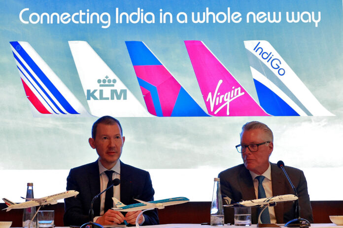 Air France-KLM CEO Benjamin M. Smith and Delta Air Lines CEO Edward Herman Bastian attend a press conference at an annual meeting of the International Air Transport Association (IATA) in New Delhi