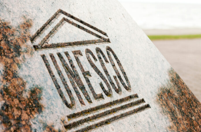 UNESCO world heritage sign carved on stone