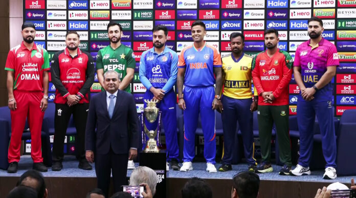 Captains of all eight teams and ACC President Mohsin Naqvi pose for a picture at the unveiling of the Men's T20 Asia Cup 2025 trophy