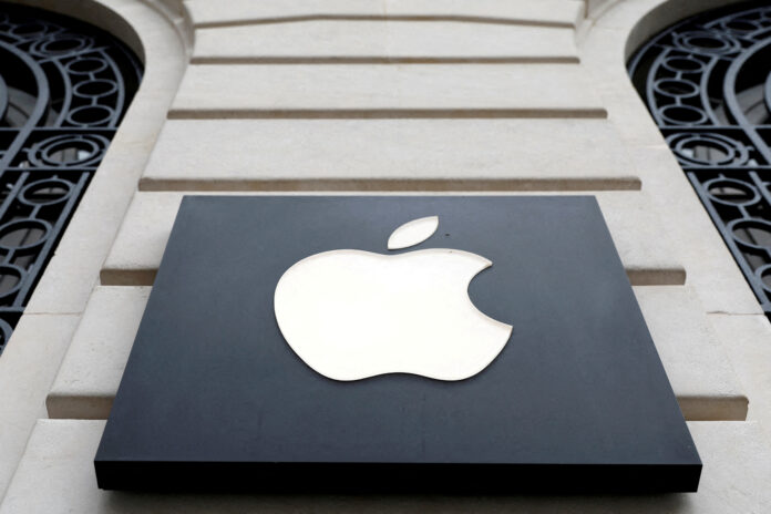 FILE PHOTO: Apple logo at an Apple store in Paris