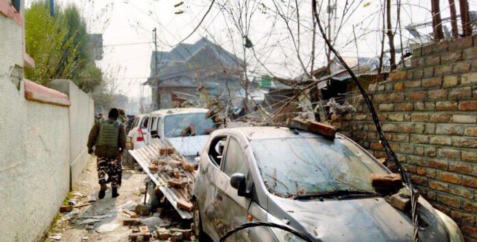 A view of a damaged Nowgam police station after a blast occurred.