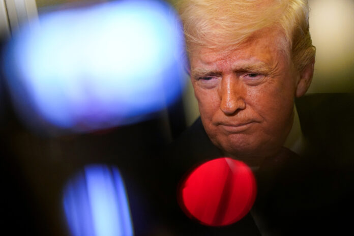 U.S. President Donald Trump on board Air Force One for travel to Joint Base Andrews