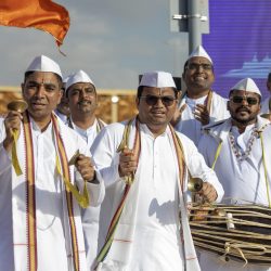 Devotees singing festive songs to greet PM Narendra Modi-min